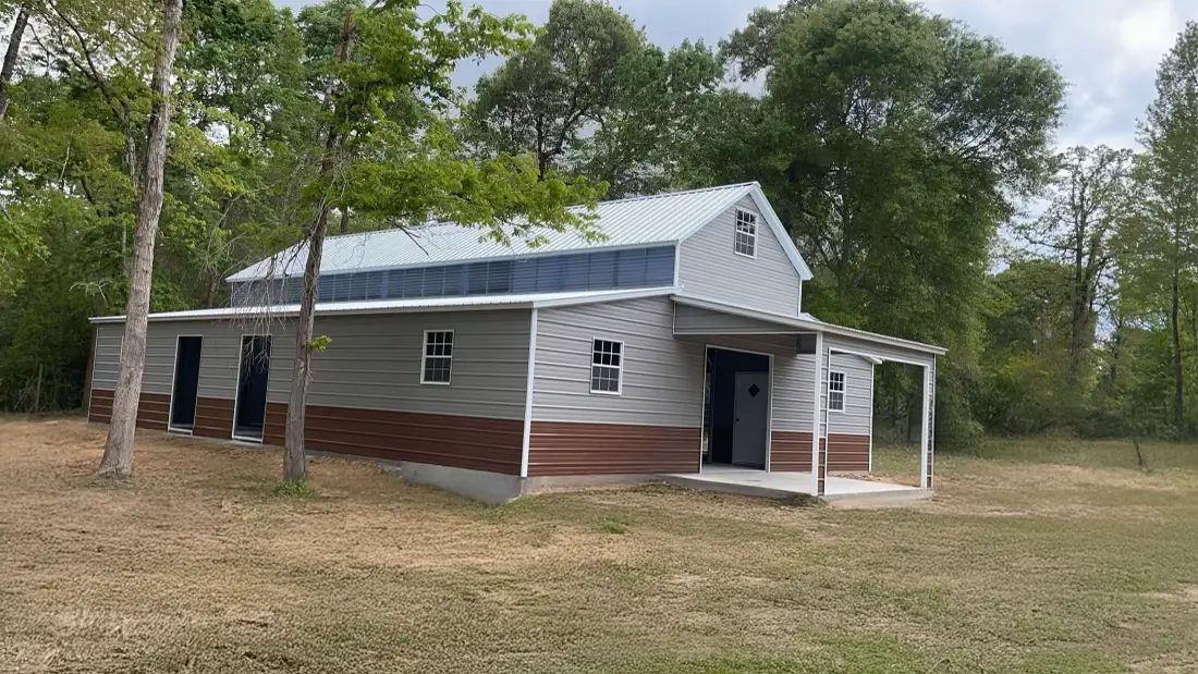 East TX Carports step down barn in pewter gray with copper trim