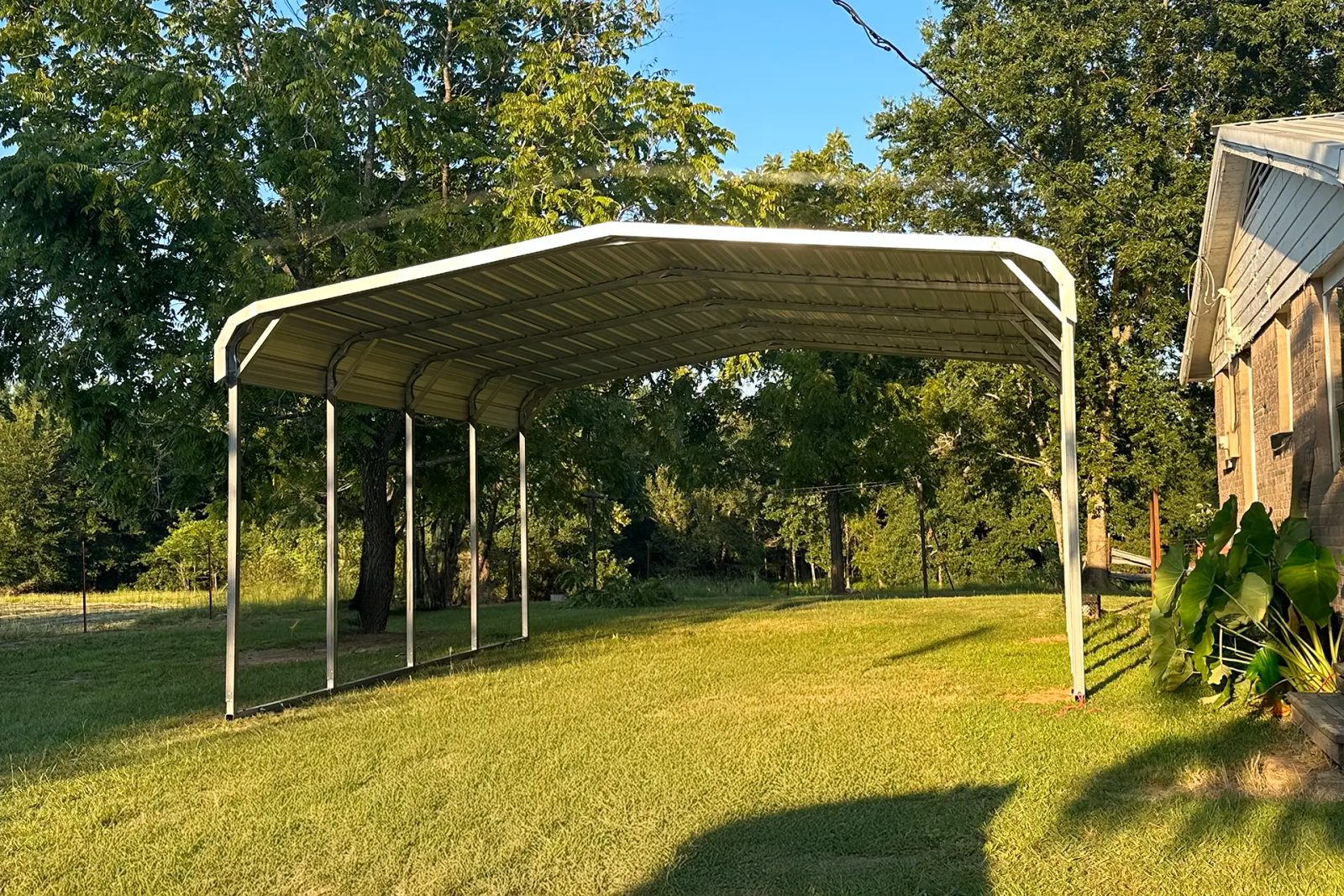 East TX Carports metal carport on an open property